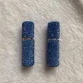 Detail view of 10ml blue rhinestone refillable perfume spray bottle with luxury finish - Light Blue