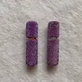 Close-up of luxury 10ml purple rhinestone-encrusted portable perfume spray bottles - Light Violet