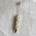 Close-up of decorative ballpoint pen with butterfly charms and pearls - Yellow White Gradient Butterfly Style (蝴蝶圆珠笔)