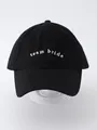 Close-up view of black cotton baseball cap featuring white 'team bride' embroidery - Adjustable / Black