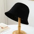 Breathable black handmade knitted bucket hat for summer beach sun protection on wooden stand - M (56-58cm) / Hollow Crochet Style (5643) / Black