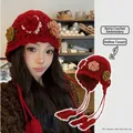Red hollow crochet knitted beanie hat featuring vintage floral embroidery and long tassels - M (56-58cm) / Colorful Flower Pattern / Red