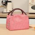 Red and white striped insulated lunch bag with comfortable braided brown handles - Standard Striped Style / Red Stripes