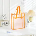 Bolsa de PVC transparente con asas naranjas para documentos y artículos de oficina. - Vertical / Naranja Vibrante