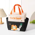 Insulated cartoon lion lunch bag with double pockets and bright orange handles. - Black/Orange Lion Cartoon Style / Black & Orange Patchwork