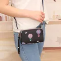 Compact crossbody phone bag with hot air balloon print and three-layer zip design - Black Balloon (Shoulder Strap Style)