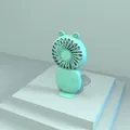 Detail view of a mint green portable rechargeable mini fan on a minimalist teal stand - Sheep Style (Mint Green)