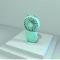 Close-up of mint green cute mini portable USB fan with animal ear design on display - 6th Gen Cartoon (Sheep/Green)