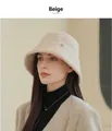Close-up of a beige textured wool bucket hat worn by an Asian model for winter warmth - M (56-58cm) / Beige