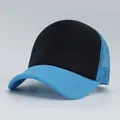 Detail view of a stylish blue and black mesh trucker hat perfect for outdoor activities. - M (56-58cm) / Blue Black