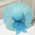 Chapeau de soleil en paille à large bord turquoise avec taches colorées - M / Bleu
