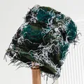 Unisex distressed camo knit bucket hat with decorative yarn fringe in green tones - M (56-58cm) / Camo Green