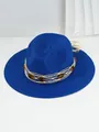 Detailed view of a blue woven straw sun hat featuring elegant amber stone embellishments. - M (56-58cm) / Sapphire Blue
