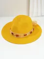 Detail view of a vibrant yellow Panama straw hat with amber beads and a woven band. - M (56-58cm) / Yellow