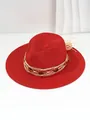 Detailed view of vibrant red woven straw Panama sun hat with amber beads decoration. - M (56-58cm) / Red
