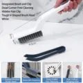White multi-functional gap cleaning brush with hair tweezer and V-shaped bristles. - Dual Action Brush and Clip / White
