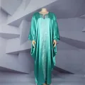 Close-up of loose emerald green African kaftan dress with silver Greek key pattern detail. - One Size / Dresses / Lake Blue