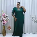 Detailed view of elegant green African plus size dress with rhinestone neckline - 2XL / Dresses / Dark Green