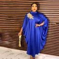 Elegant royal blue African kaftan dress with gold floral appliqué and batwing sleeves detail. - Dresses / Blue
