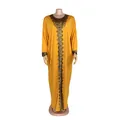 Full view of yellow African style maxi dress with golden lace details on mannequin - One Size / Dresses / Yellow