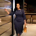 Elegant navy blue bodycon dress with three-quarter sleeves and stylish fringe hem detail. - Black