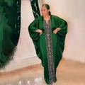Elegant emerald green plus size African kaftan dress featuring a classic black meander border - One Size / Dresses / Green