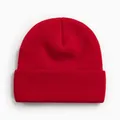 Vue détaillée d'un bonnet en maille rouge vif avec un revers classique. - Style Tricoté à Bord Replié / Rouge