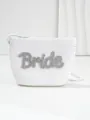 Detail view of the shimmering rhinestone Bride lettering on a white woven straw bag - Multi-color Zirconia Style