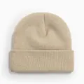 Détail d'un bonnet en maille côtelée beige pour la chaleur hivernale - Style Tricoté à Bord Replié / Flocons d'avoine