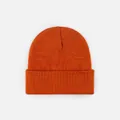 Vue détaillée de la texture et du revers d'un bonnet en maille acrylique orange vif - Style Tricoté à Bord Replié / Rouge Orangé