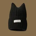 Cute black knitted cat ear beanie hat for women, providing cozy winter warmth and style - Black-White Label