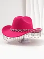 Detailed view of a stylish pink cowboy hat with heart rhinestones and fringe tassels. - M (56-58cm) / Rose Red