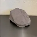 Side view of a vintage suede flat cap in greyish-brown, highlighting soft texture - M / Gray