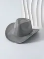 Macro view of a stylish metallic silver women's cowboy hat featuring a fine woven texture. - Silver