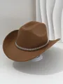 Detalle de un sombrero de vaquero de fieltro marrón con decoración de púas plateadas. - M (56-58cm) / Camel