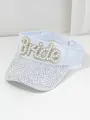 Vista detallada de una visera blanca decorada con letras Bride en perlas y pedrería - M (56-58cm) / Perla Artificial Blanca BRIDE