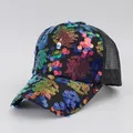 Detailed close-up of vibrant multicolored sequins on a black Y2K retro mesh trucker hat - M (56-58cm) / Multicolor Sequins / Black