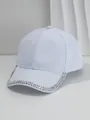 Detailed view of light blue baseball cap featuring silver metal stud embellishments - M (56-58cm) / White