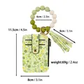 Detaillierte Maße des floralen Kartenhalters mit Silikonperlen-Armband und Quaste. - Grün