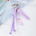 Detailed macro view of a purple woven rope keychain featuring Mama charm and heart beads - Purple
