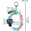 Llavero de pulsera creativo de silicona para enfermera con borla azul y colgantes - Estilo Cadena de Cuentas