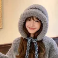 Cozy thick grey plush winter ear protection hat featuring decorative blue braided straps - One Size / Gray