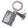 Grey silicone beaded wristlet with TEACH letters and leather tassel card holder. - Purple