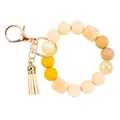 Yellow silicone bead wristlet keychain with decorative acrylic stone and tassel charm - Yellow