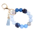 Blue candy-colored silicone bead wristlet keychain with acrylic accents and tassel - Blue