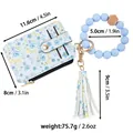 Blue floral print leather card holder wallet with silicone bead wristlet and tassel - Blue