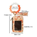 Florales Kartenetui mit Silikonperlen-Armband, Schlüsselanhänger und Quaste. - Orange