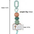 Schlüsselanhänger aus Silikonperlen mit Buchanhänger und Kreuz in Mintgrün - Karabiner-Stil / Smaragdgrün