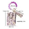 Kartenhalter aus Leder mit Blumenmuster, Silikonperlen-Armband und Quastenanhänger - Lila