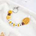Handmade yellow silicone beaded keychain with leaf charm and LOVE letter beads for bags - Yellow